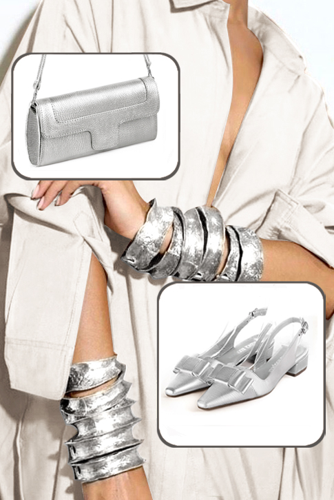 Women's silver elegant slingback heels, with a bow on the front. Tapered toe. Low block heels - Worn view